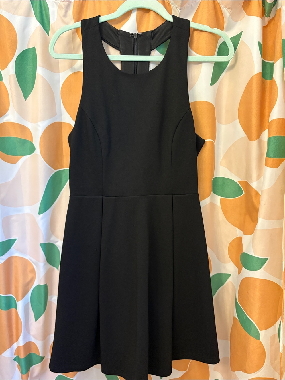 Women’s Black Sleeveless Fit-and-Flare Dress with Cut outs